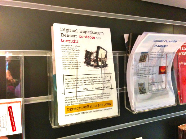 Image for Placing flyers in a Nijmegen library on the 2016 Day Against DRM